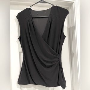 Black blouse size small from whit house black market